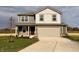 Two-story house with neutral siding and landscaping at 1126 Fleming Dr, Greenfield, IN 46140