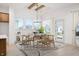 Dining area with wood beams, chandelier, and access to backyard at 15827 Scarteen Rd, Fishers, IN 46040