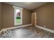 Bright bedroom with new flooring and neutral walls at 1202 S Shipley St, Muncie, IN 47302