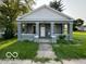 Gray house with white trim and a front porch at 1202 S Shipley St, Muncie, IN 47302
