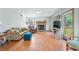 Spacious living area with brick fireplace and large windows at 1936 Broadmoor Ln, Columbus, IN 47203