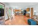 Open concept kitchen and living area with hardwood floors at 1936 Broadmoor Ln, Columbus, IN 47203