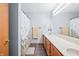 Double vanity bathroom with shower/tub combo at 1936 Broadmoor Ln, Columbus, IN 47203