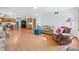 Open floor plan with hardwood floors and kitchen view at 1936 Broadmoor Ln, Columbus, IN 47203