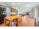 Open concept kitchen and living area with hardwood floors at 1936 Broadmoor Ln, Columbus, IN 47203