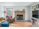 Brick fireplace as a focal point in the living room at 1936 Broadmoor Ln, Columbus, IN 47203