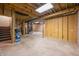 Unfinished basement with high ceilings and ample space at 1936 Broadmoor Ln, Columbus, IN 47203