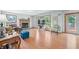 Living room with hardwood floors and access to deck at 1936 Broadmoor Ln, Columbus, IN 47203