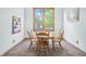 Small dining area with a wooden table and four chairs at 1936 Broadmoor Ln, Columbus, IN 47203