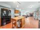 Open concept kitchen with island and stainless steel appliances at 1936 Broadmoor Ln, Columbus, IN 47203