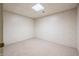 Partially finished basement room with carpeted floor at 1936 Broadmoor Ln, Columbus, IN 47203