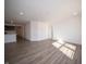 Open concept living room with kitchen and hallway access at 6205 Card Blvd, Indianapolis, IN 46221