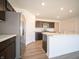 Modern kitchen with stainless steel appliances and island at 6205 Card Blvd, Indianapolis, IN 46221