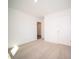 Spacious bedroom with neutral carpeting and ample closet space at 6205 Card Blvd, Indianapolis, IN 46221