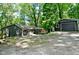 Gray house with detached garage; wooded, secluded setting at 236 Lakeview W Dr, Nineveh, IN 46164