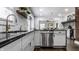 Modern kitchen with stainless steel appliances and a large island at 1210 Finley Ave, Indianapolis, IN 46203