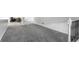 Upper hallway with grey carpet and staircase at 1210 Finley Ave, Indianapolis, IN 46203