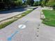 Pleasant Run Trail path marked with blue arrows and signage at 1210 Finley Ave, Indianapolis, IN 46203
