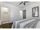 Bedroom with hardwood floors, en-suite bathroom, and a ceiling fan at 1210 Finley Ave, Indianapolis, IN 46203