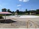 Spray park with water features and shaded seating areas at 1210 Finley Ave, Indianapolis, IN 46203