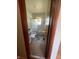 Clean bathroom with a shower/tub combo, tile flooring, and neutral colors at 2416 Radcliffe Ave, Indianapolis, IN 46227