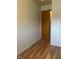 Empty bedroom with light walls and wood-look flooring at 2416 Radcliffe Ave, Indianapolis, IN 46227