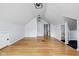 Spacious bonus room with hardwood floors and wood accent wall at 7201 N Illinois St, Indianapolis, IN 46260