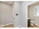 Half bathroom conveniently located near main living areas at 1098 Gatewick Ct, Greenwood, IN 46143