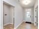 Welcoming entryway with hardwood flooring, access to a half-bath at 1098 Gatewick Ct, Greenwood, IN 46143