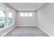 Cozy office space with plush carpeting and abundant natural light from multiple windows at 1098 Gatewick Ct, Greenwood, IN 46143
