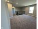 Open loft area with carpeted flooring and railing at 1099 Gatewick Ct, Greenwood, IN 46143