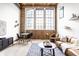 Open concept living space with exposed brick and a dining area at 735 Lexington Ave # Apt 8, Indianapolis, IN 46203