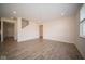 Spacious Gathering room with hardwood floors and access to kitchen and stairs at 91 Booth St, Whiteland, IN 46184