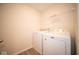 Convenient laundry room with washer and dryer hookups at 91 Booth St, Whiteland, IN 46184