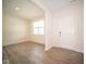 Bright entryway with wood-look floors and open concept at 91 Booth St, Whiteland, IN 46184
