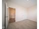 Bright bedroom with carpet flooring and access to hallway at 91 Booth St, Whiteland, IN 46184