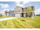 Two story home with brick and siding exterior at 91 Booth St, Whiteland, IN 46184