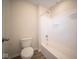 Clean bathroom featuring a shower/tub combo and wood-look flooring at 91 Booth St, Whiteland, IN 46184