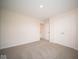 Spacious bedroom with neutral carpeting and double door closet at 91 Booth St, Whiteland, IN 46184