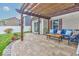 Pergola covered patio with seating area at 1558 Wedgewood Pl, Avon, IN 46123