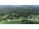 Aerial view of property showing houses, barn and fields at 4463 W 700 S, Trafalgar, IN 46181