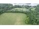 Aerial view showing property's location near a lake and other homes at 4463 W 700 S, Trafalgar, IN 46181