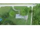 Top-down aerial view of a ranch home with a large backyard and surrounding trees at 4463 W 700 S, Trafalgar, IN 46181