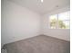 Spacious bedroom with neutral carpeting and large window at 3809 S Woodfield Dr, New Palestine, IN 46163