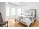 Bright bedroom with bay window and hardwood floors at 8011 Morningside Dr, Indianapolis, IN 46240