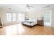 Bright bedroom with hardwood floors and en-suite bathroom at 8011 Morningside Dr, Indianapolis, IN 46240