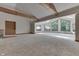 Sun-drenched living room with large windows and high ceilings at 7601 S 700 W, Morgantown, IN 46160