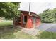Red outbuilding with multiple doors at 7601 S 700 W, Morgantown, IN 46160