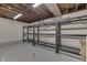 Unfinished basement with shelving at 7601 S 700 W, Morgantown, IN 46160