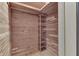 Cedar closet with shelves and hanging rod at 7601 S 700 W, Morgantown, IN 46160